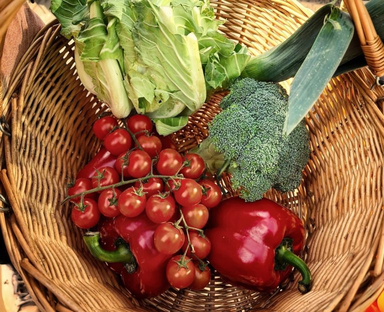 A wicker basket of vegetables