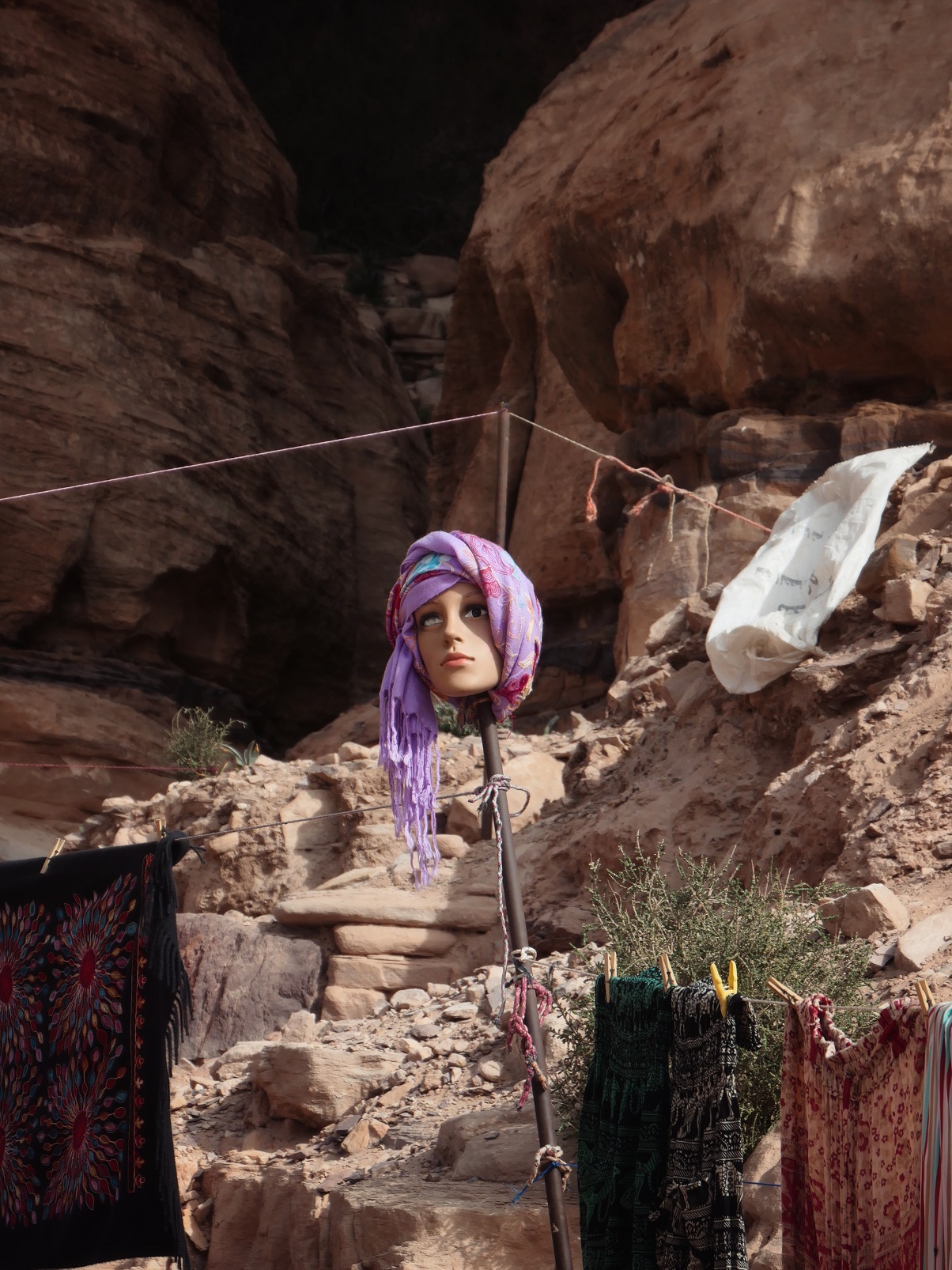A mannequin head used to show off a head scarf at Petra
