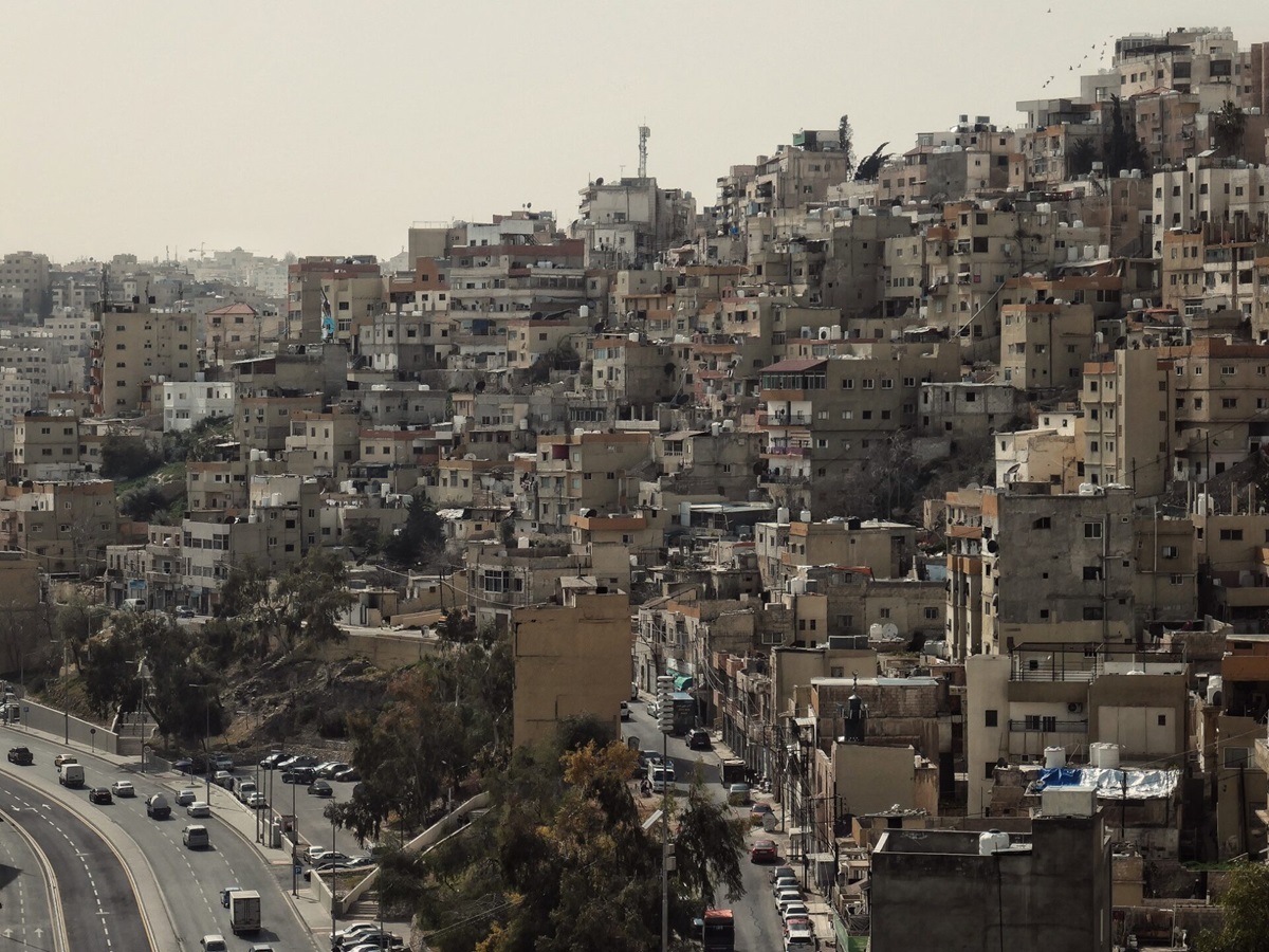 Tiered rows of housing within the cityscape of Amman in Jordan.