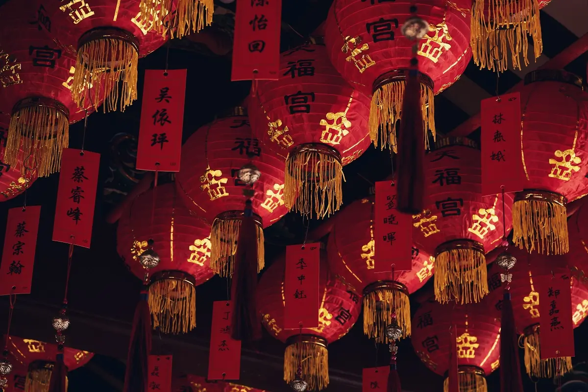 Chinese lanterns hanging from the ceiling in the Chinatown district of Singapore.