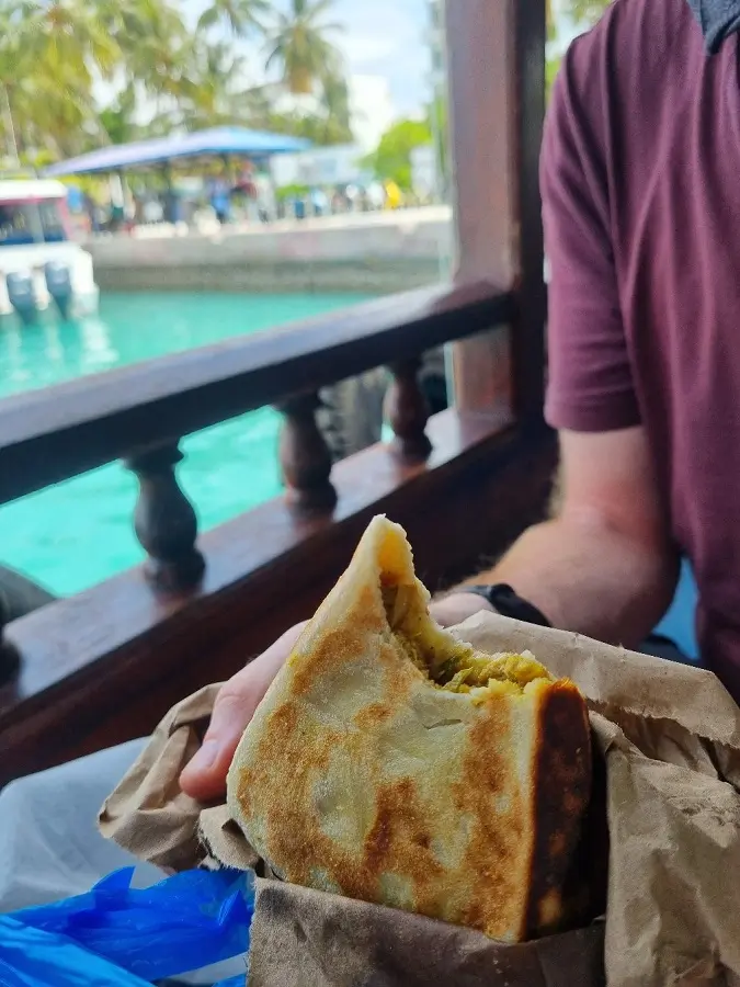 A spicy tuna and coconut parcel eaten on a Maldivian public ferry.
