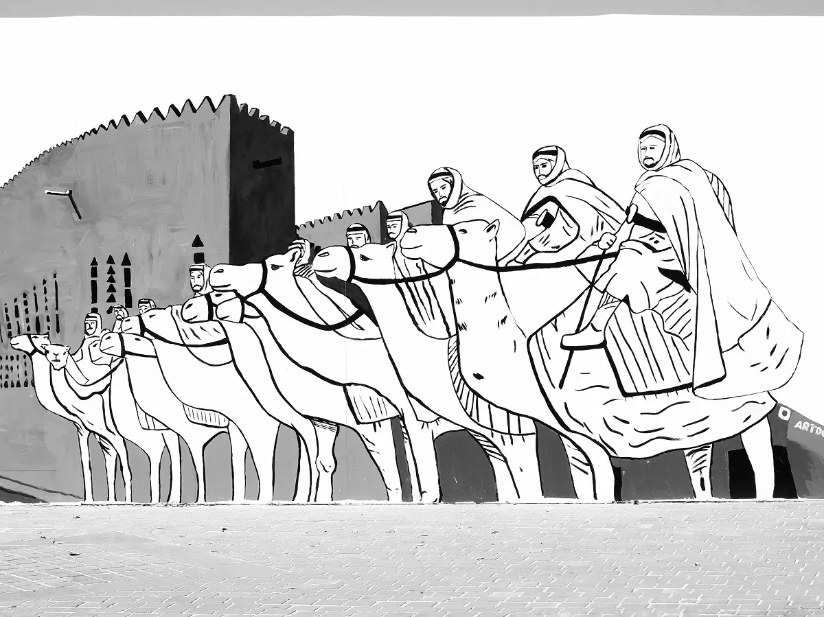 Riders on camelback on a mural in the old town of Al Balad.