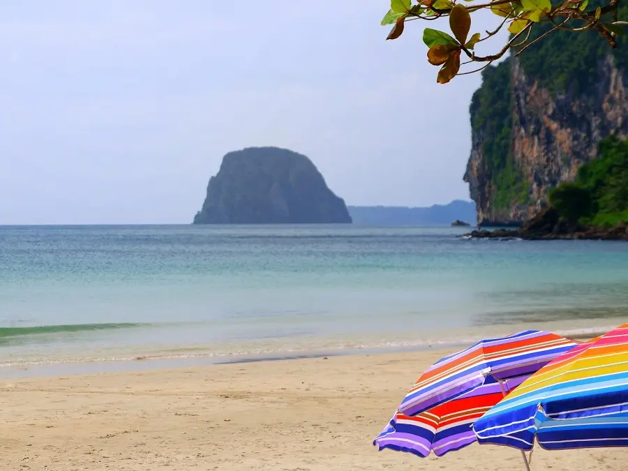 Multi-coloured parasols on Ko Mook's Charlie beach, one of our favourites on a south Thailand itinerary.