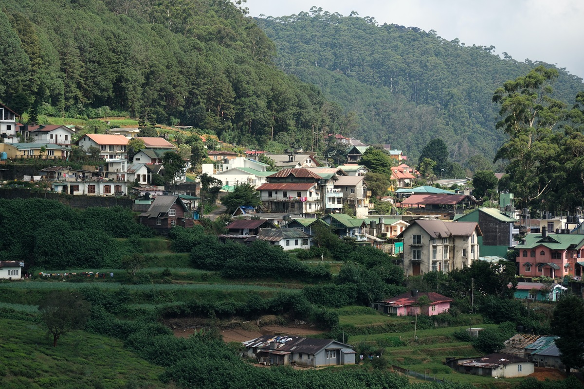 Colourful houses on the verdant hillside around Newara Eliya, Sri Lanka.