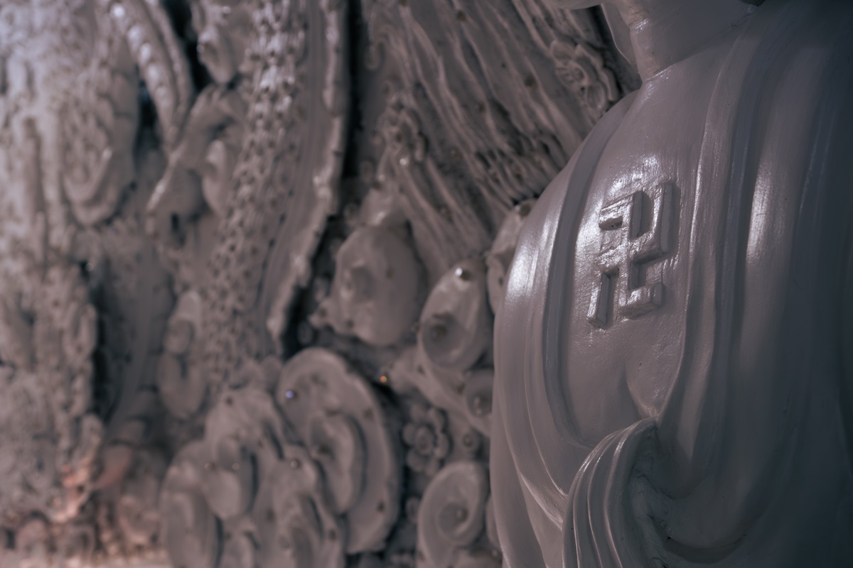 A buddhist symbol inside the statue of the Goddess of Mercy.