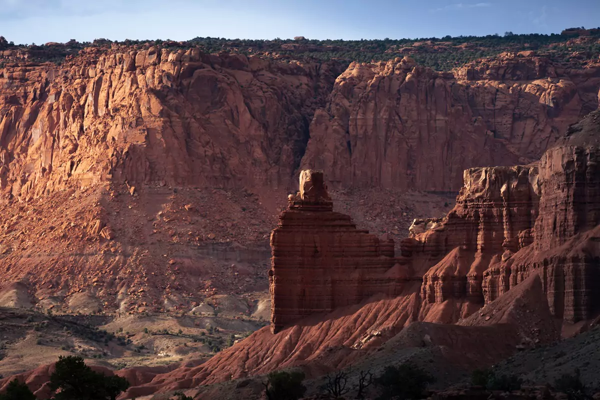 Sunset light on the exposed sandstone rock formations at Capitol Reef.