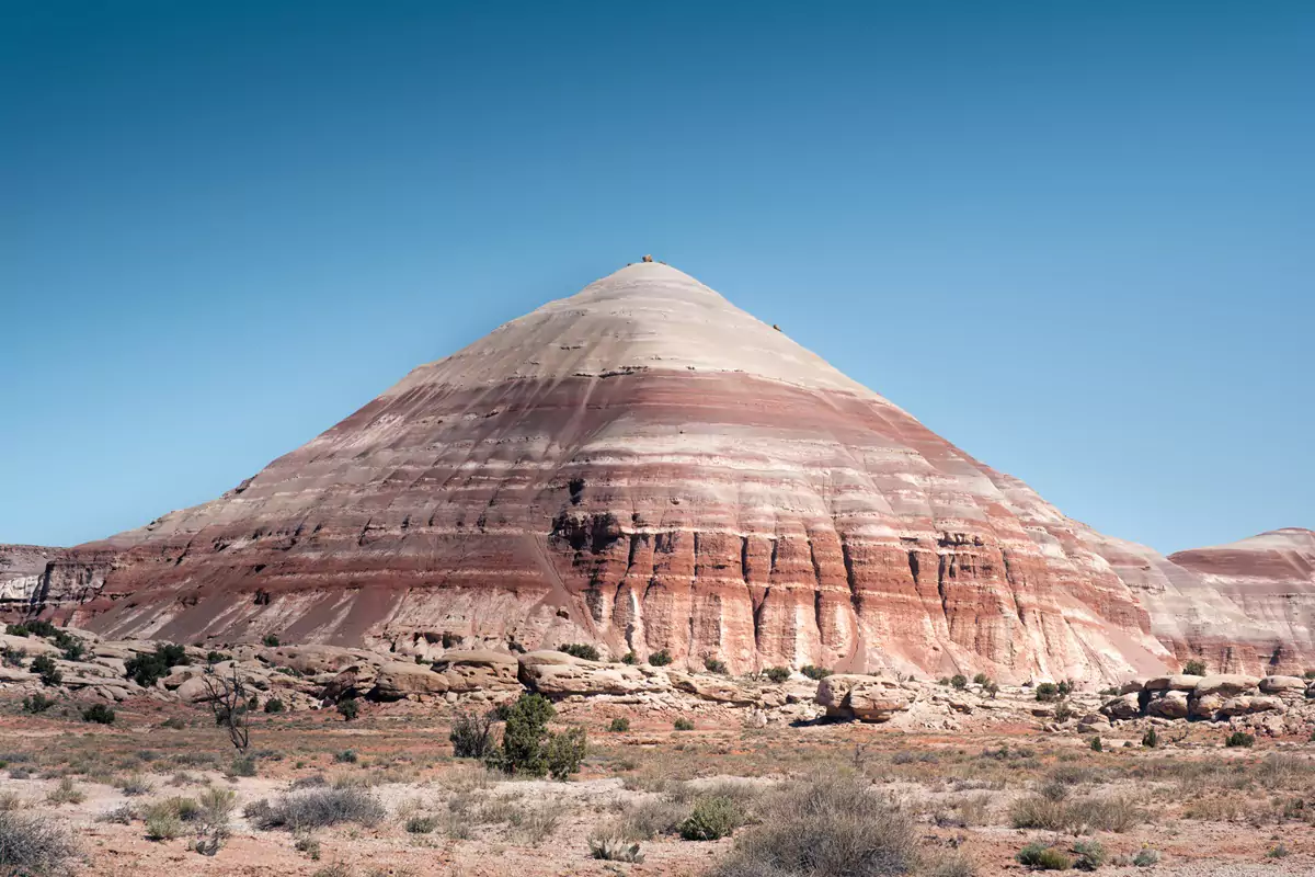 Layers of different sandstone layers and colours in the Bentonite Hills within Capitol Reef's Cathedral Valley.