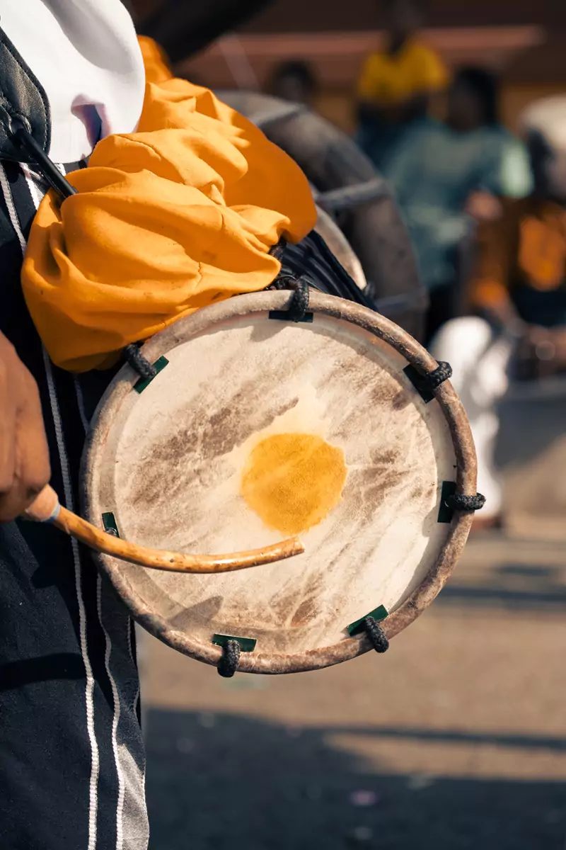 A drum with a yellow spot used during Thaipusam.