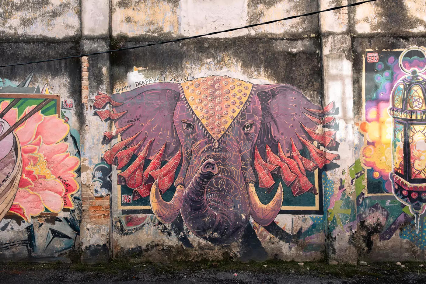 A more recently painted mural of a purple elephant to celebrate Deepavali in 2021, located in Mural Art's Lane in Ipoh, Malaysia.