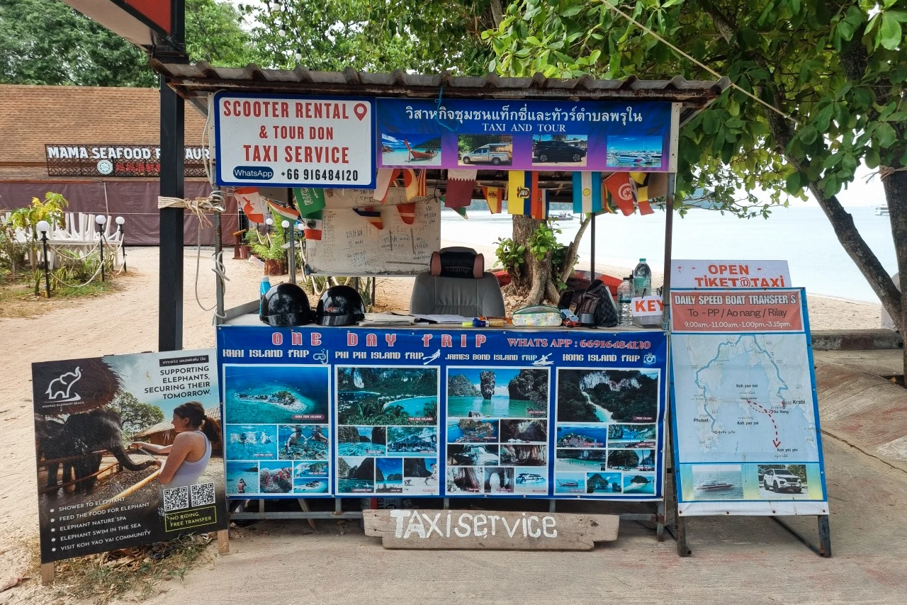 A tour operator stand by the beach front on Koh Yao Yai.