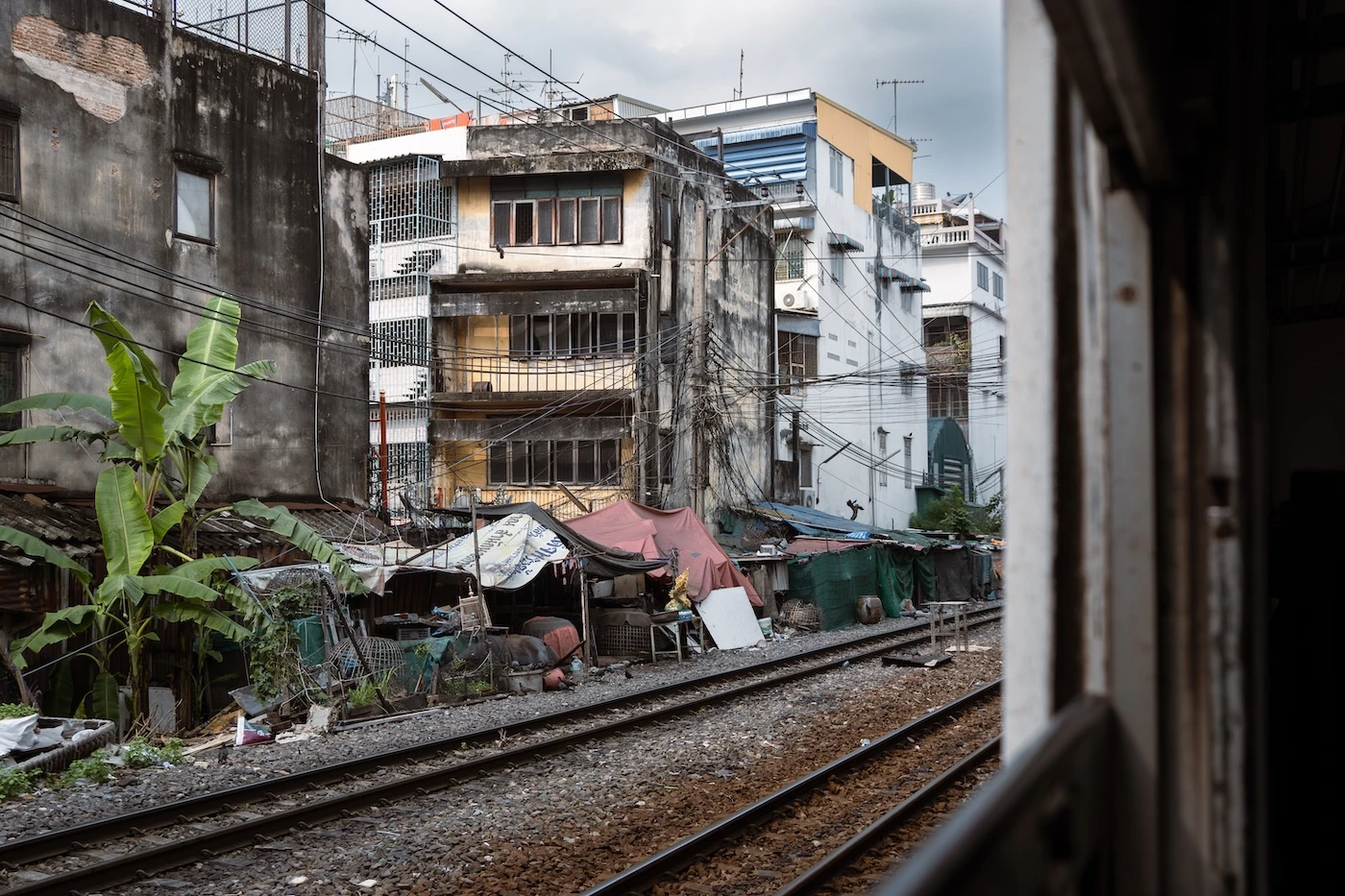Housing along the side of the train tracks from Bangkok to Ayutthaya.