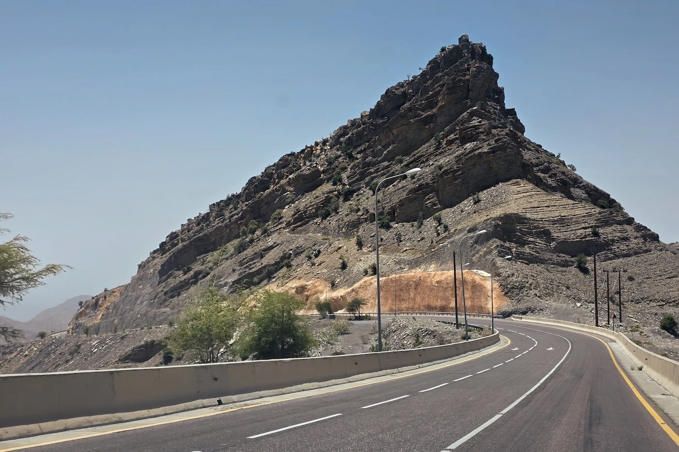 Main paved highway leading up the mountain range of Jebel Akhdar in Oman.