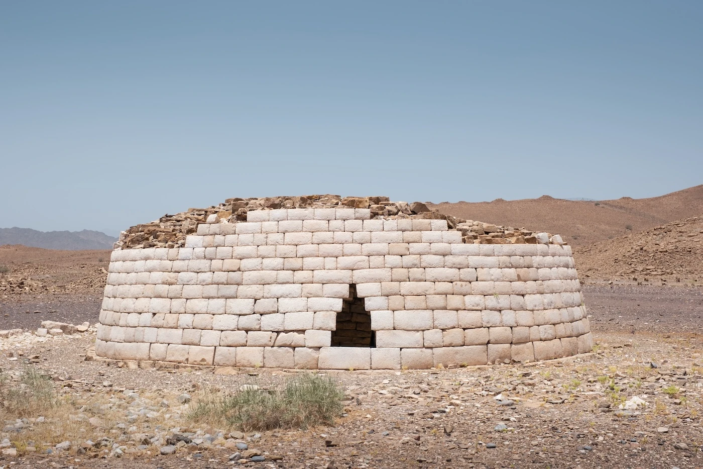 A restored brick-built tomb at Bat's archaeological site in Oman.