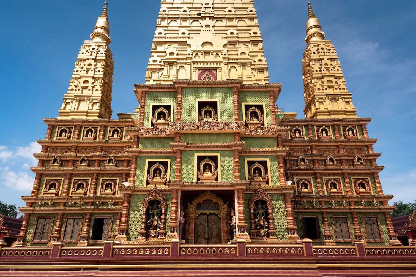 Green and gold design of Wat Bang Thong's 95m tall main temple building.