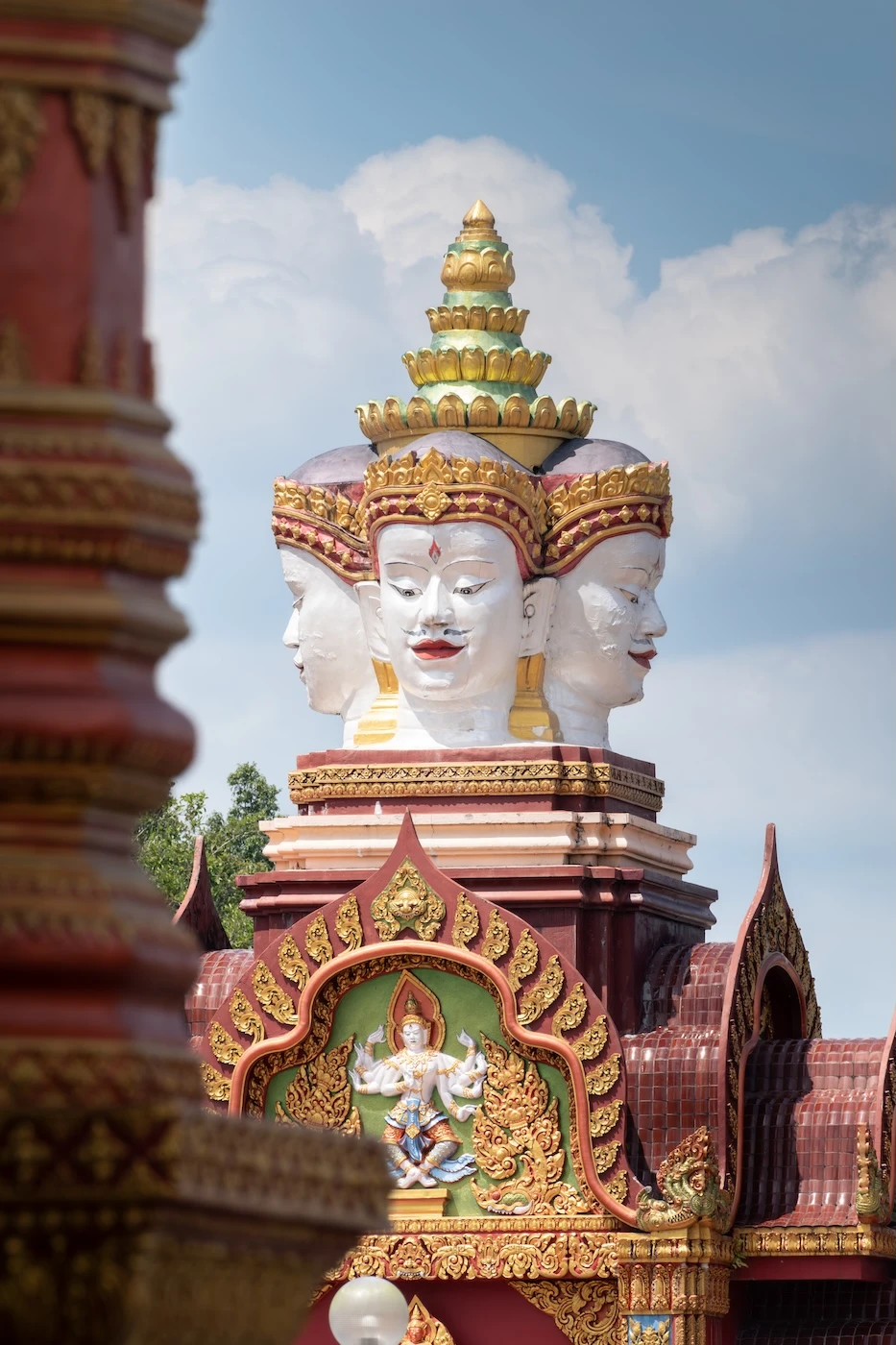 A temple decoration at Wat Bang Thong Temple of a Four Faced Buddha.